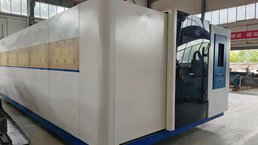 AC380V/50Hz/60Hz পাওয়ার সাপ্লাই এক্সচেঞ্জ টেবিল লেজার কাটিং মেশিন বন্ধ সুরক্ষা কভার সহ 3000W লেজার শক্তি 4